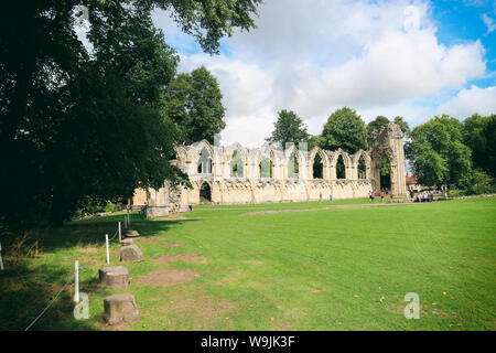 Remains of St. Mary`s abbey in York, United Kingdom, in beautiful, green park, Museum gardens Stock Photo